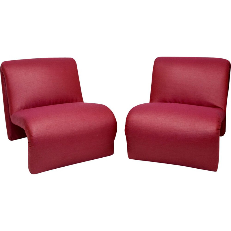 Pair of red low chairs by Etienne Fermigier