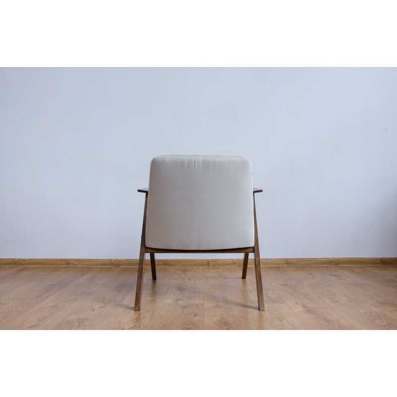 Vintage white armchair from the 60s