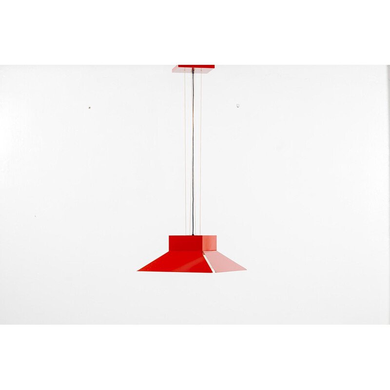 Vintage red enamelled metal shade hanging on a red ceiling light by artimeta