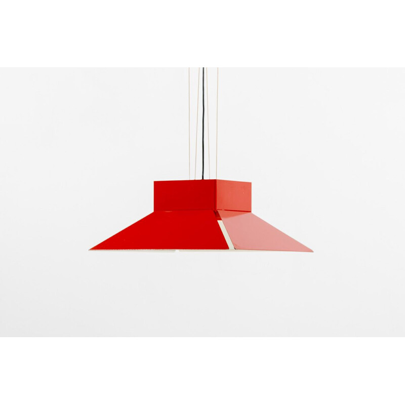 Vintage red enamelled metal shade hanging on a red ceiling light by artimeta