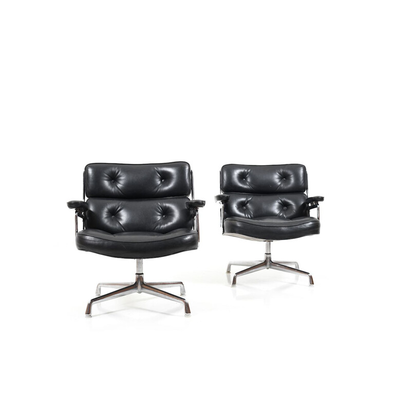 Vintage pair of black leather armchairs by Charles and Ray Eames,1950