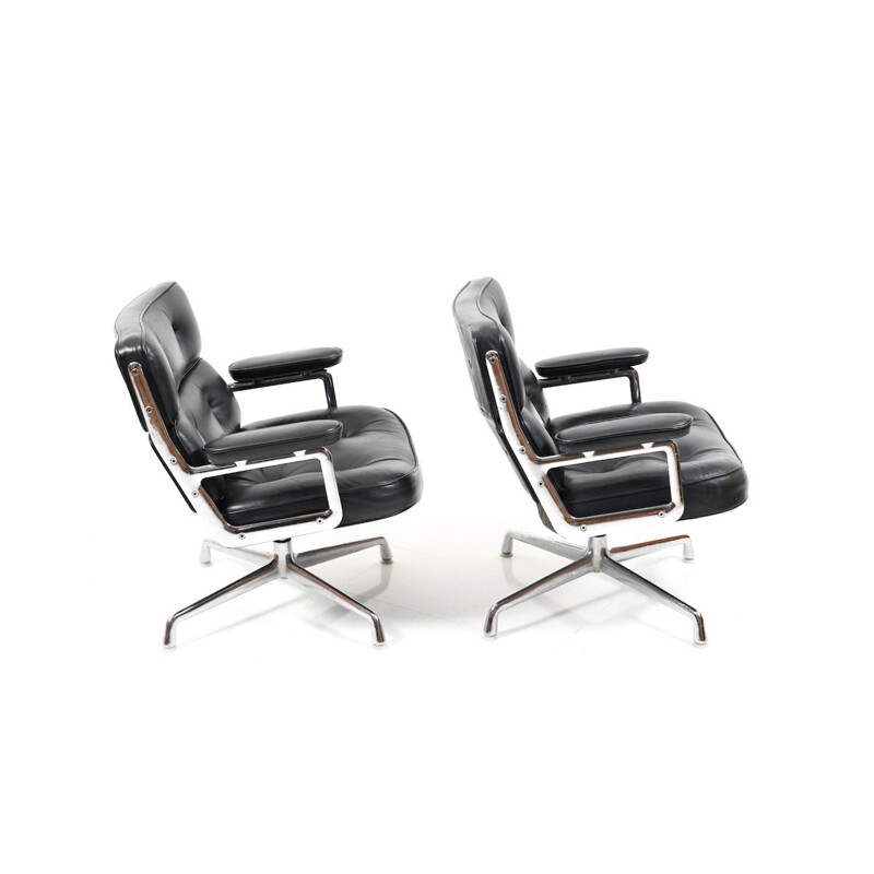 Vintage pair of black leather armchairs by Charles and Ray Eames,1950