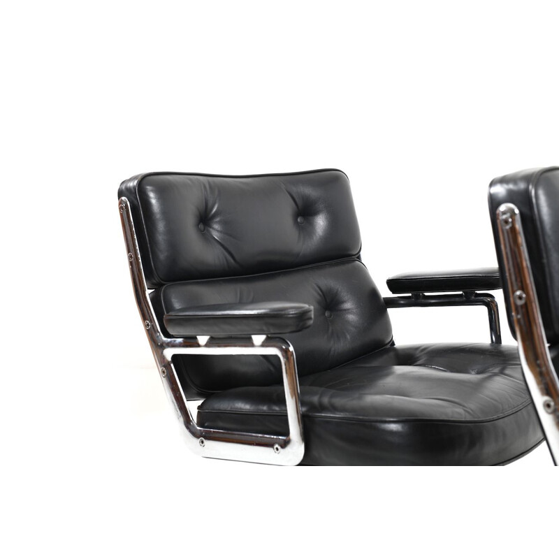 Vintage pair of black leather armchairs by Charles and Ray Eames,1950