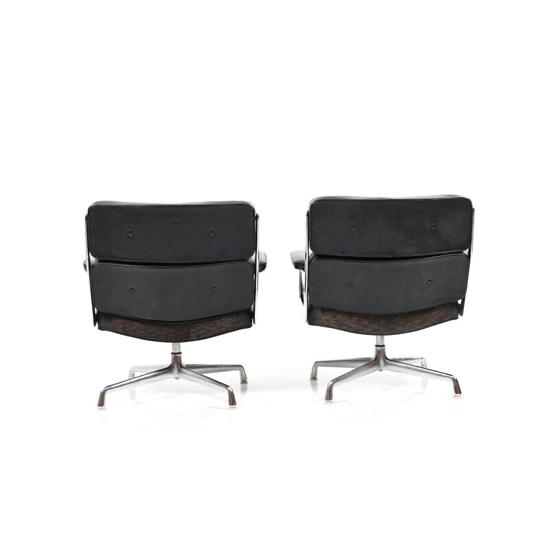 Vintage pair of black leather armchairs by Charles and Ray Eames,1950