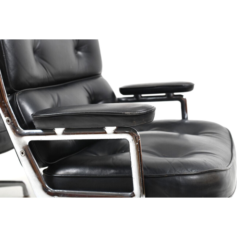 Vintage pair of black leather armchairs by Charles and Ray Eames,1950