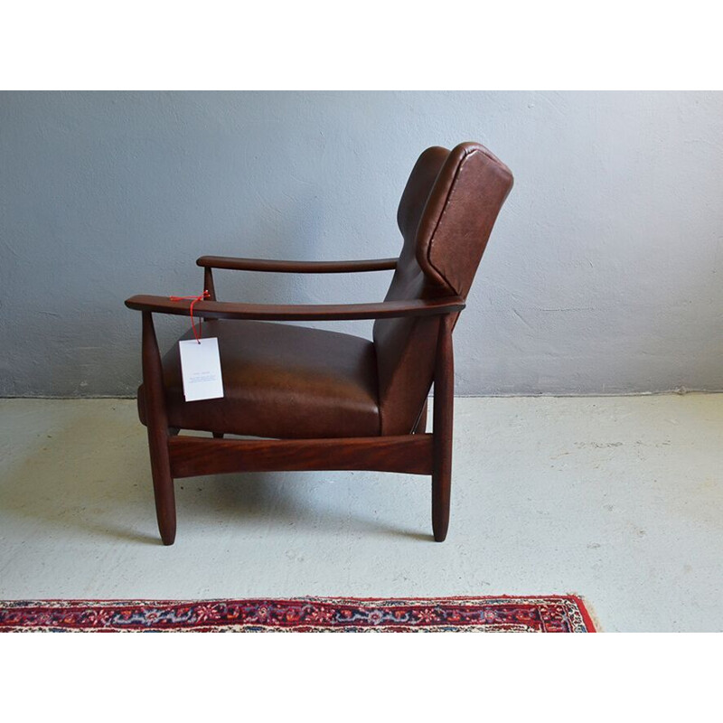 Vintage armchair in teak and brown leather,1960