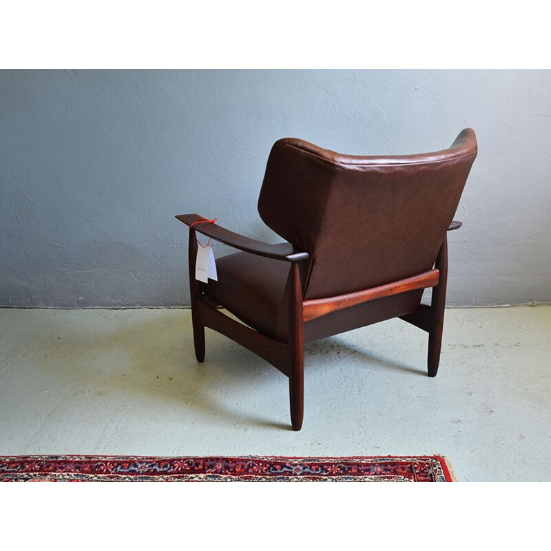 Vintage armchair in teak and brown leather,1960
