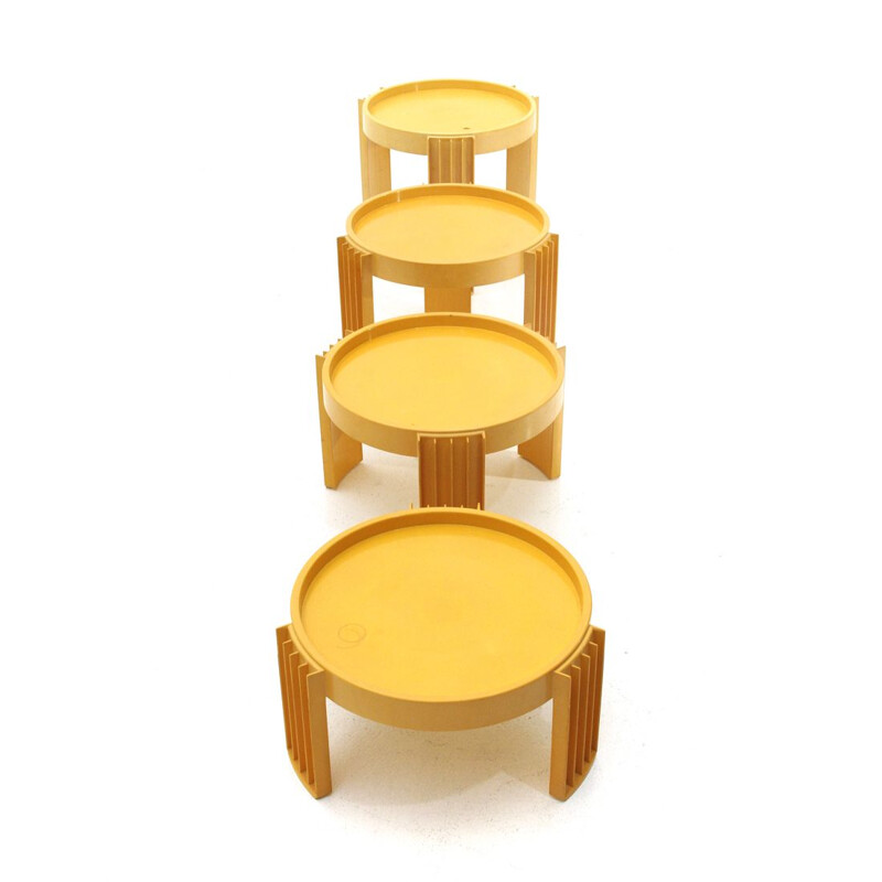 Set of 4 vintage stackable coffee tables for Cassina in yellow plastic 1950