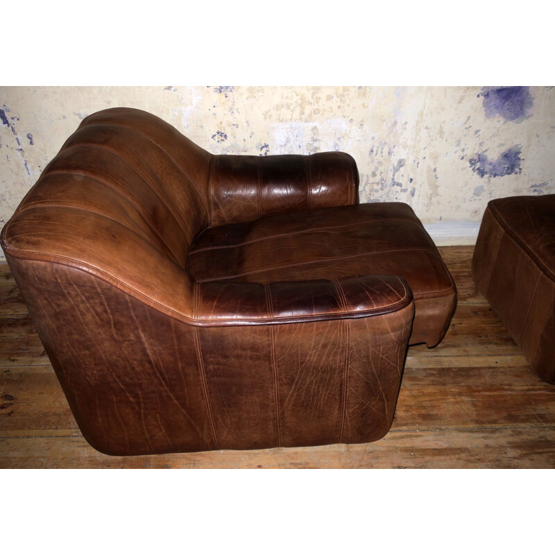 Vintage leather armchair and ottoman model De Sede DS44,1960