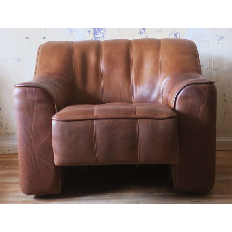 Vintage leather armchair and ottoman model De Sede DS44,1960