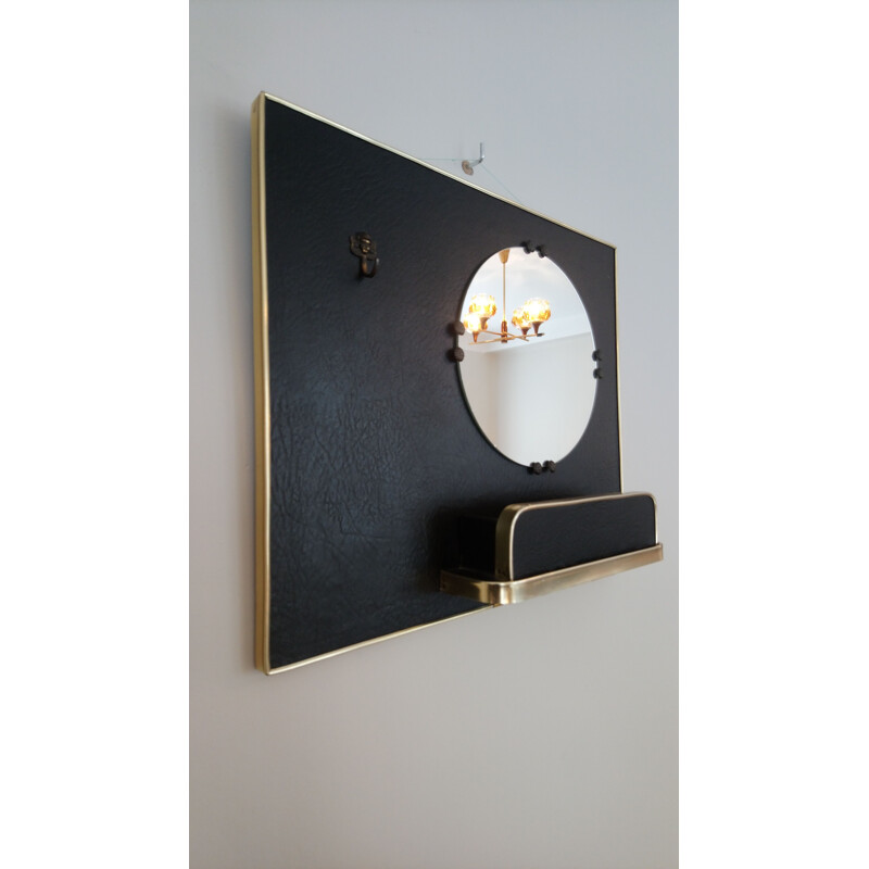 Vintage mirror in black vinyl and golden metal with trinket bowl and hook 1960