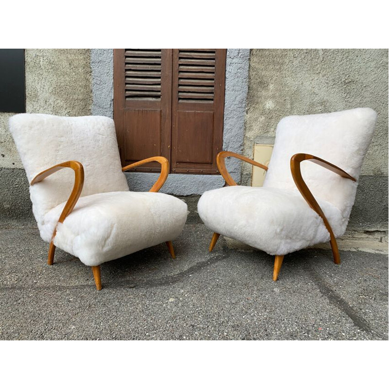 Pair of vintage armchairs by Giuglielmo Ulrich in sheepskin and wood 1960