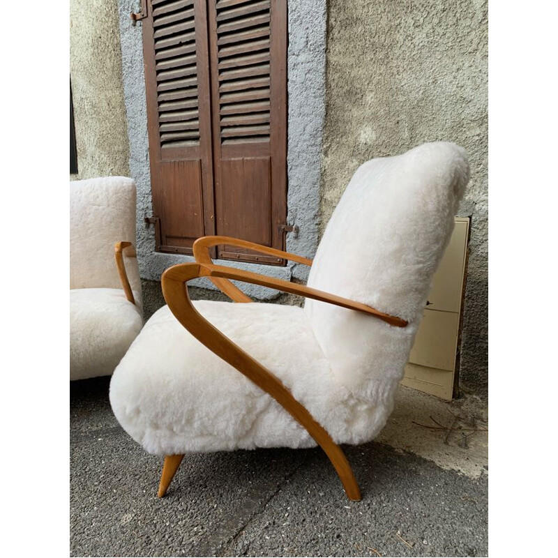 Pair of vintage armchairs by Giuglielmo Ulrich in sheepskin and wood 1960