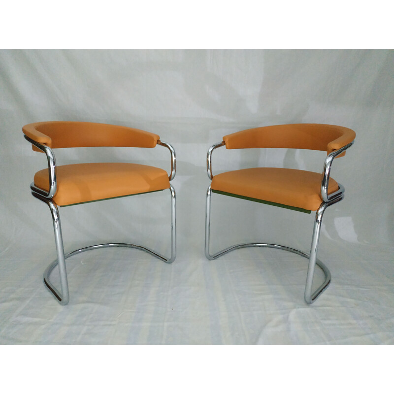 Pair of vintage armchairs in tubular chrome and leather camel 1970s