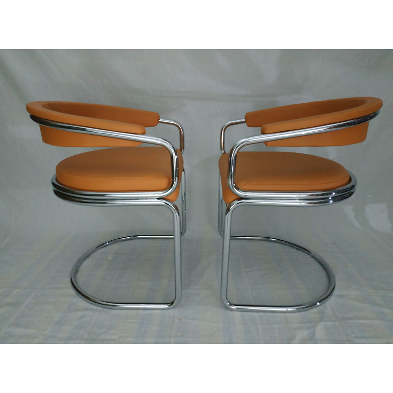 Paire de fauteuils vintage en tubulaire chromé et cuir camel 1970
