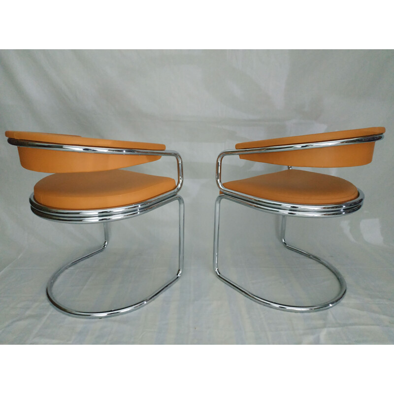 Pair of vintage armchairs in tubular chrome and leather camel 1970s