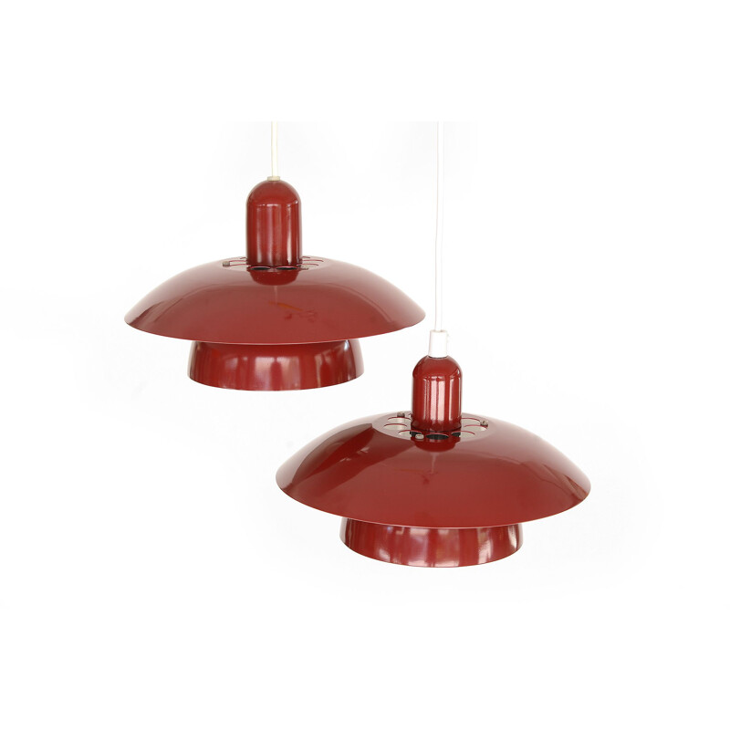 Pair of red pendant lamps by Hamalux