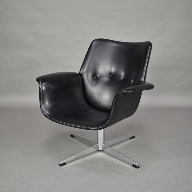 Black swiveling armchair by Topform