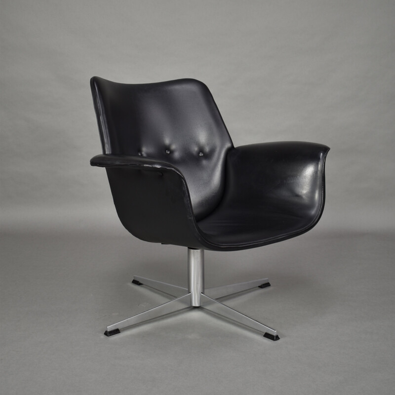 Black swiveling armchair by Topform