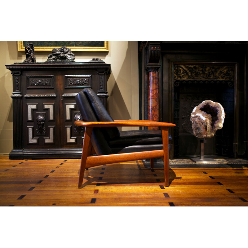 Pair of Scandinavian armchairs in black leather and teak