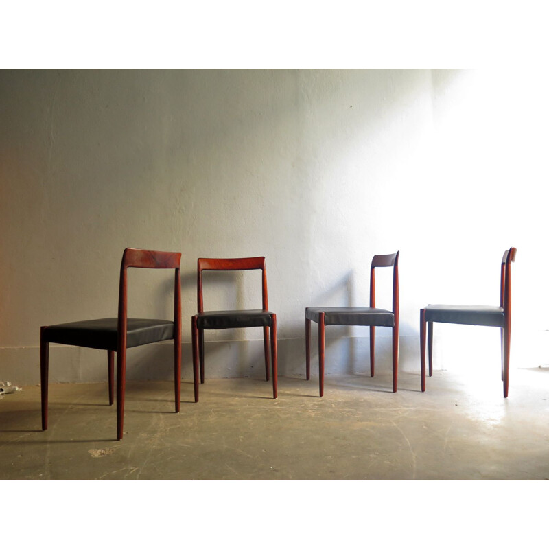 Suite de 4 chaises vintage en cuir et palissandre