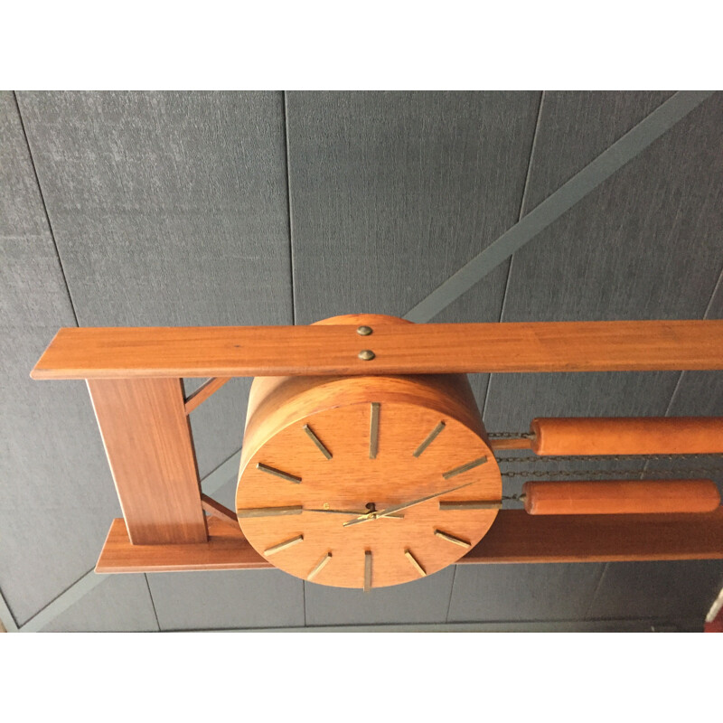 Vintage clock in teak pendulum and balance weight Scandinavian