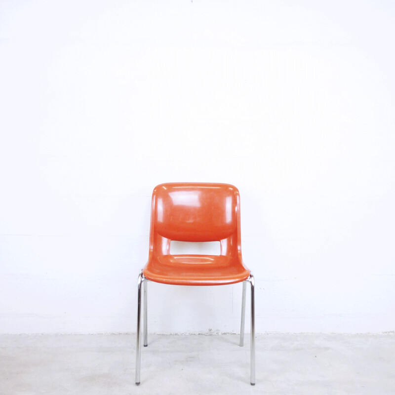 Orange school chair in plastic by ISKU OY