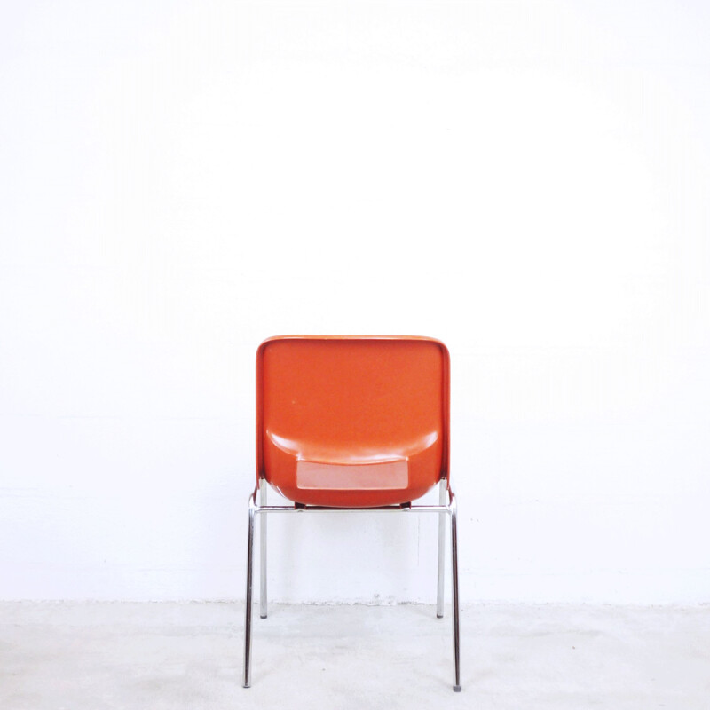 Orange school chair in plastic by ISKU OY