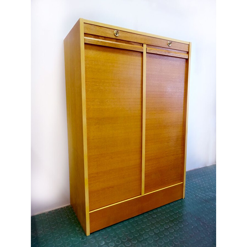 Vintage storage cabinet with double rollers 1960