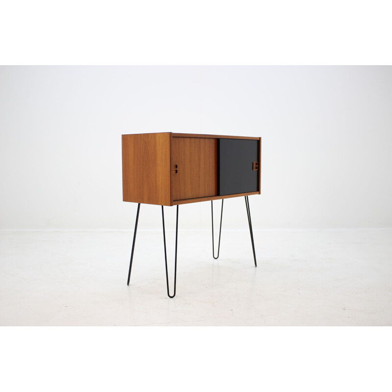 Danish teak cabinet with iron legs