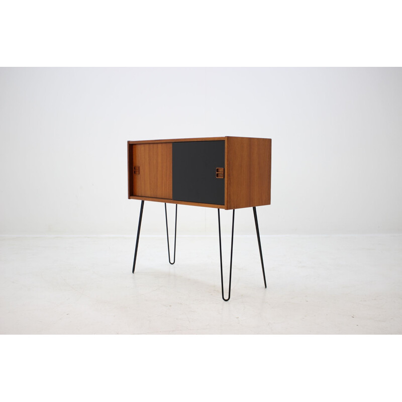 Danish teak cabinet with iron legs