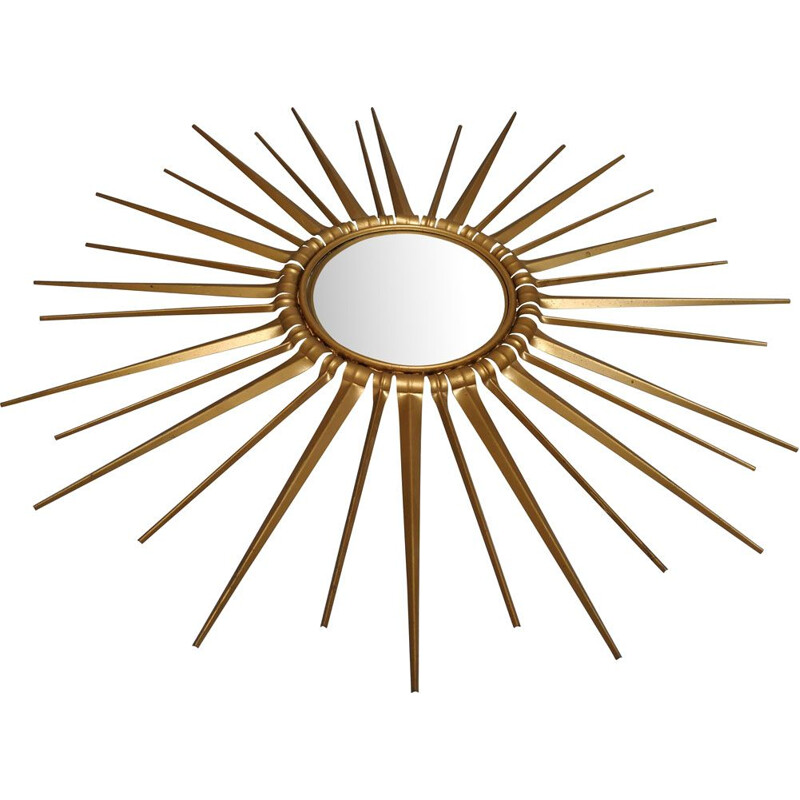 Vintage sun mirror golden metal bulging