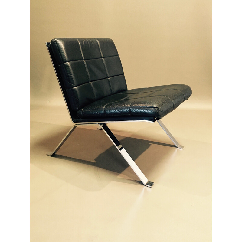 Vintage armchair in black leather by Hans Eichenberger 1960