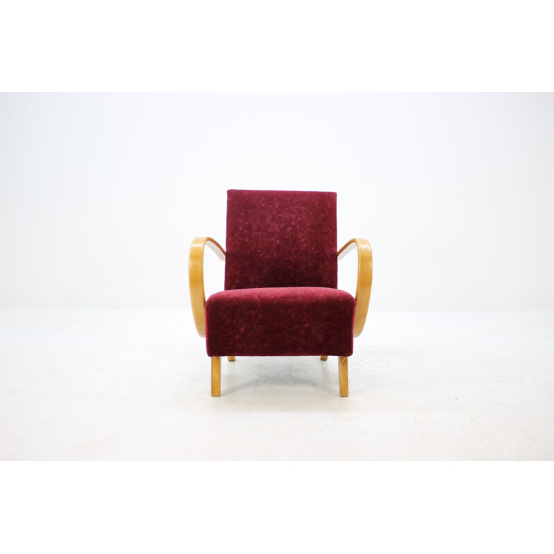 Vintage armchair by Halabala in red fabric and beechwood 1950