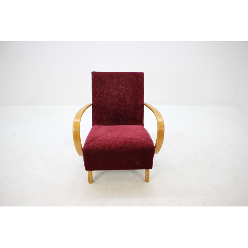 Vintage armchair by Halabala in red fabric and beechwood 1950