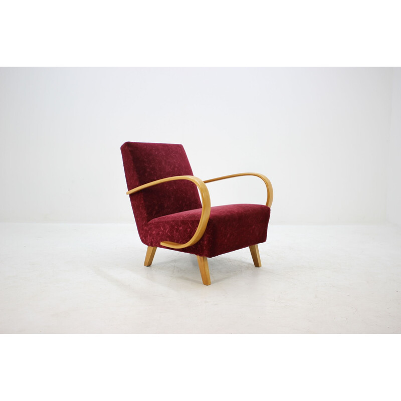 Vintage armchair by Halabala in red fabric and beechwood 1950