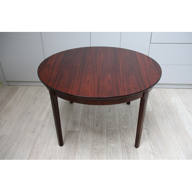 Vintage dining table in rosewood with integrated extension leaves