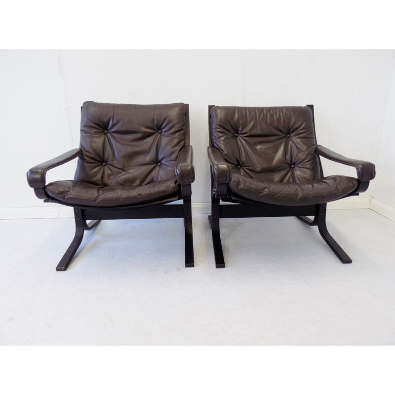 Set of 2 vintage armchairs and 1 feet stool by Ingmar Relling 1960