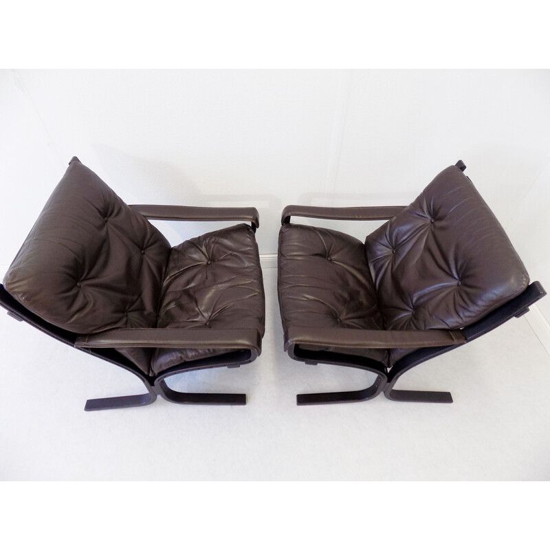 Set of 2 vintage armchairs and 1 feet stool by Ingmar Relling 1960