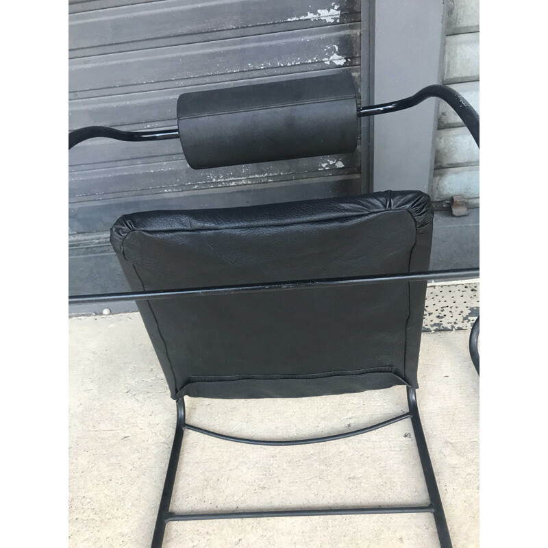 Pair of vintage armchairs in black leather and metal 1980