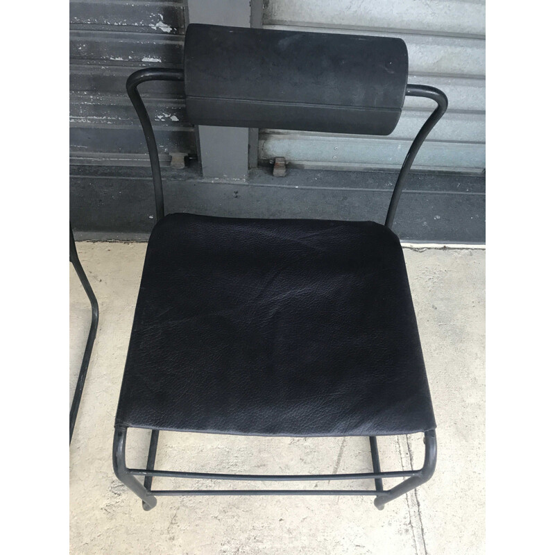 Pair of vintage armchairs in black leather and metal 1980