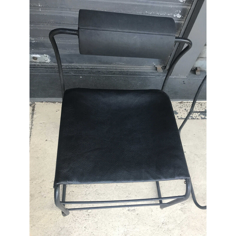 Pair of vintage armchairs in black leather and metal 1980