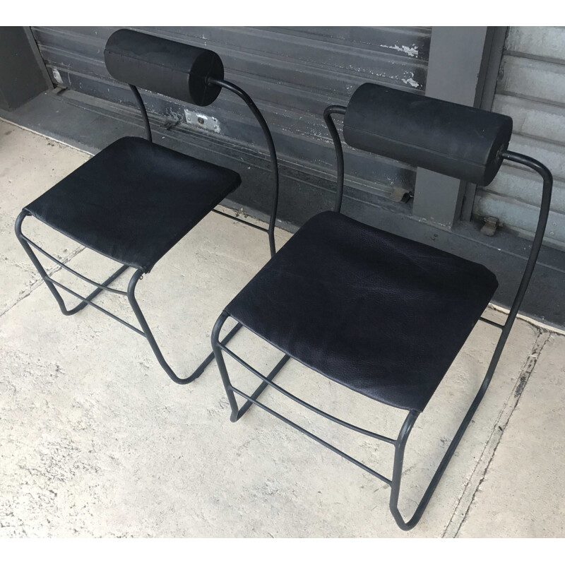 Pair of vintage armchairs in black leather and metal 1980