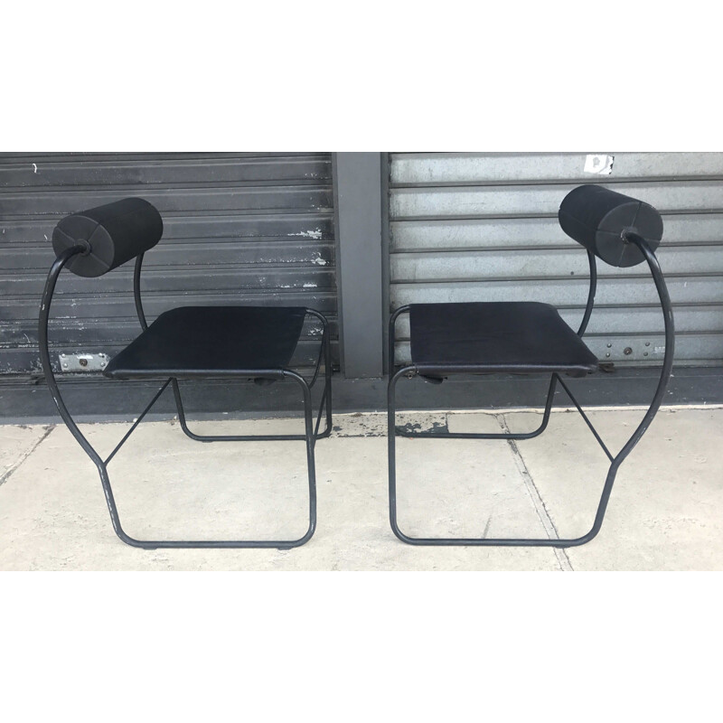 Pair of vintage armchairs in black leather and metal 1980