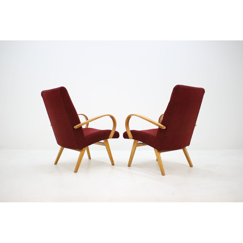 Paire de fauteuils vintage en tissu rouge et bois 1960