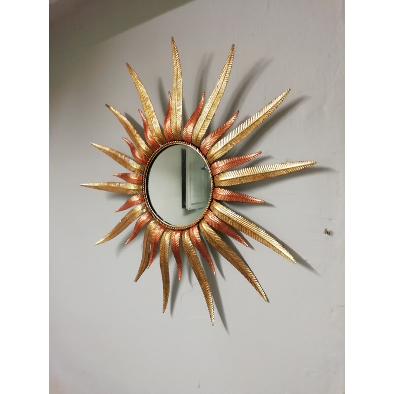 Vintage sun mirror in golden metal 1960