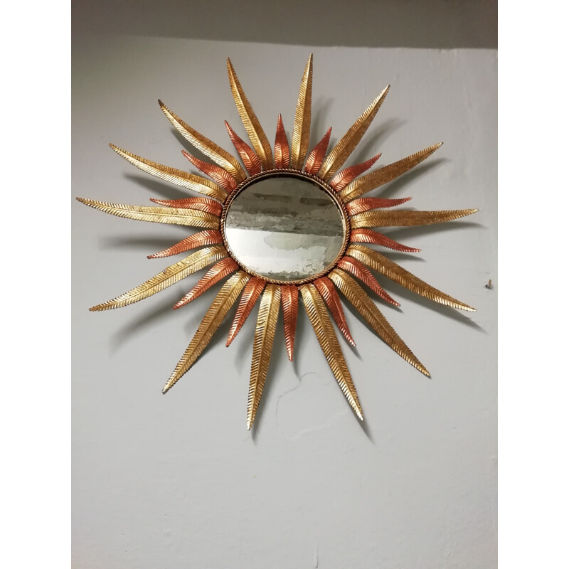 Vintage sun mirror in golden metal 1960