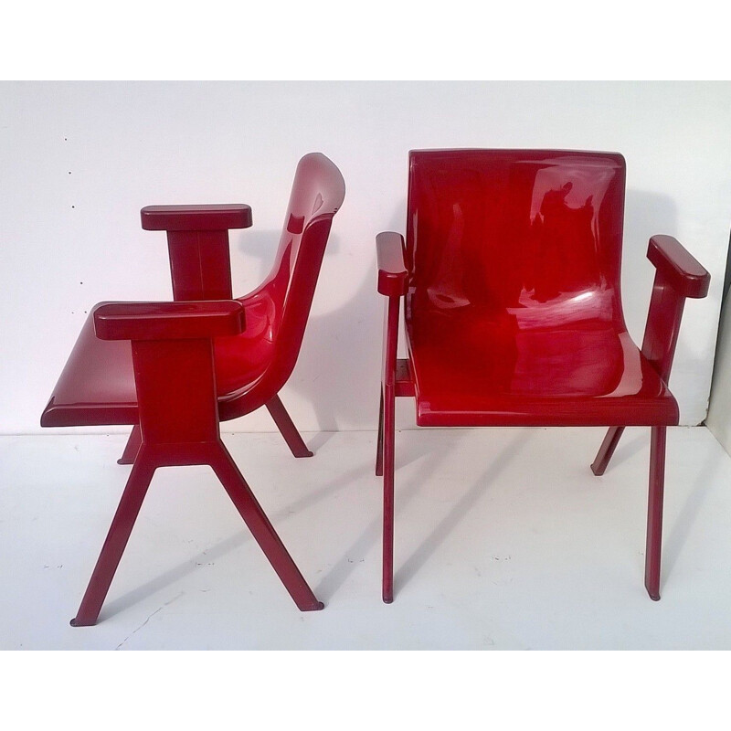 Pair of vintage red chairs for Olivetti Synthesis in plastic and aluminium 1970