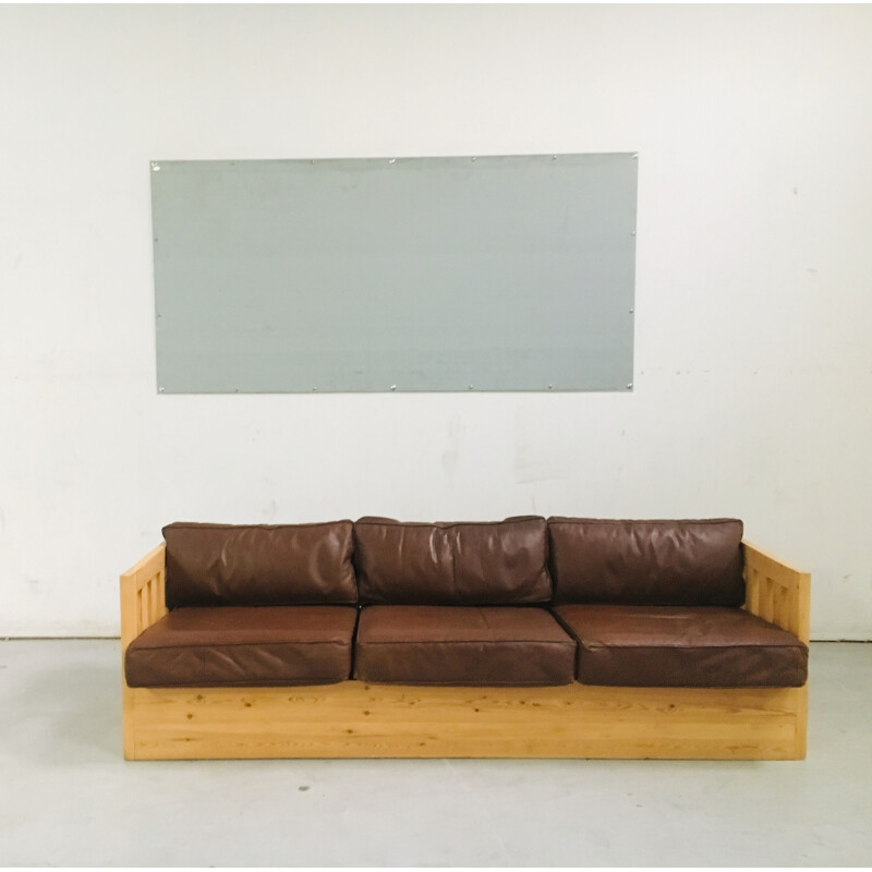 Vintage sofa in wood and leather 1960