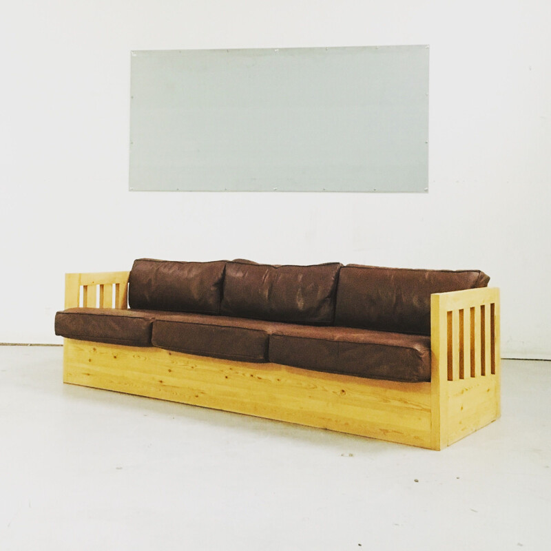Vintage sofa in wood and leather 1960